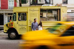 New York City Engagement Ice Cream Shoot as NYC cab drives by