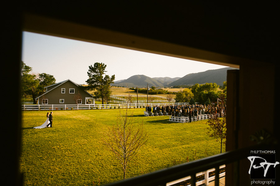 Father and daughter walk down Willow Creek Farm. Photo by Philip Thomas Photography