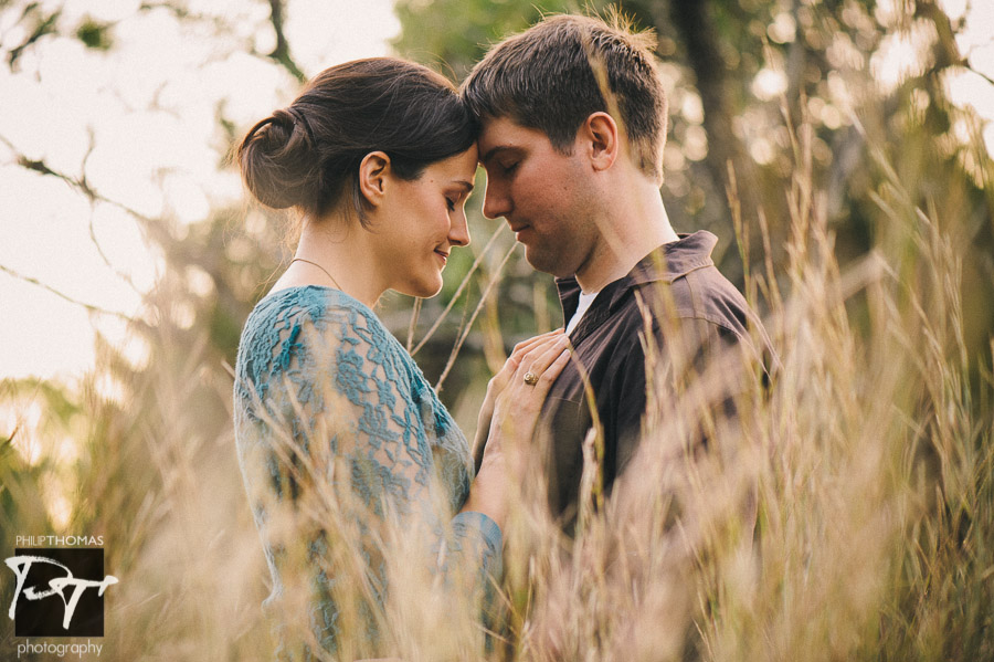 Roberta and Andrew in tall grass. Bull Creek, Austin. Photographed by Philip Thomas.