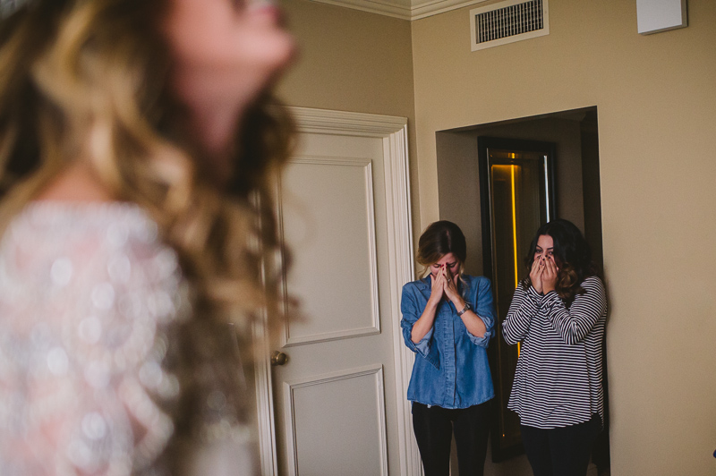 Brides friends tear up on seeing bride in dress