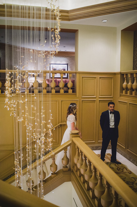 Groom approached by bride first look at St Regis Hotel Houston