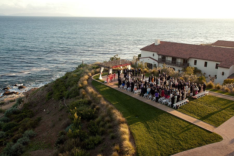 An aerial shot from a hotel balcony of a wedding at Terranea Resort, Los Angeles, California