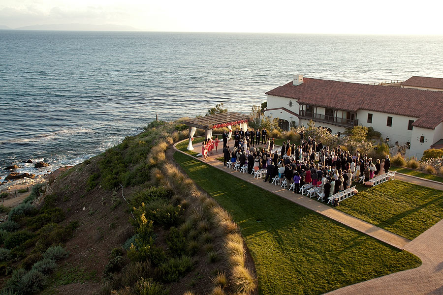 An aerial shot from a hotel balcony of a wedding at Terranea Resort, Los Angeles, California