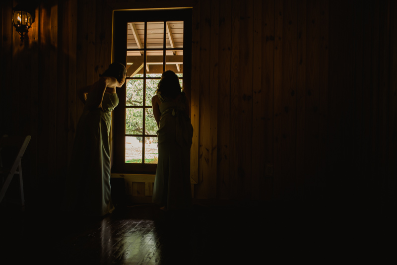 Bridesmaids checking the window at Bella Springs