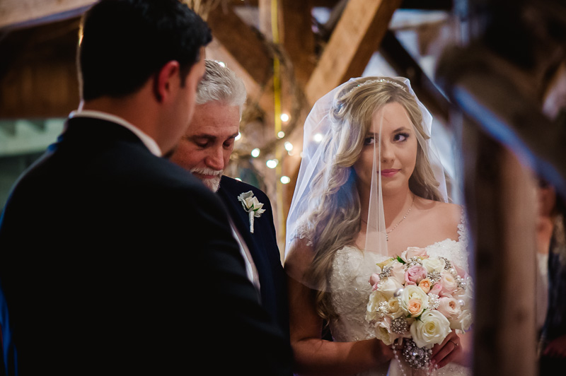 Bride steals quick look at groom