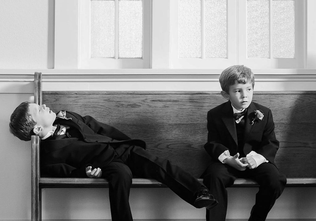 Two boys who are bored during a greek orthodox ceremony. ISPWP Award winning image