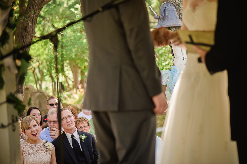 Mothers delighted face as couple exchange rings