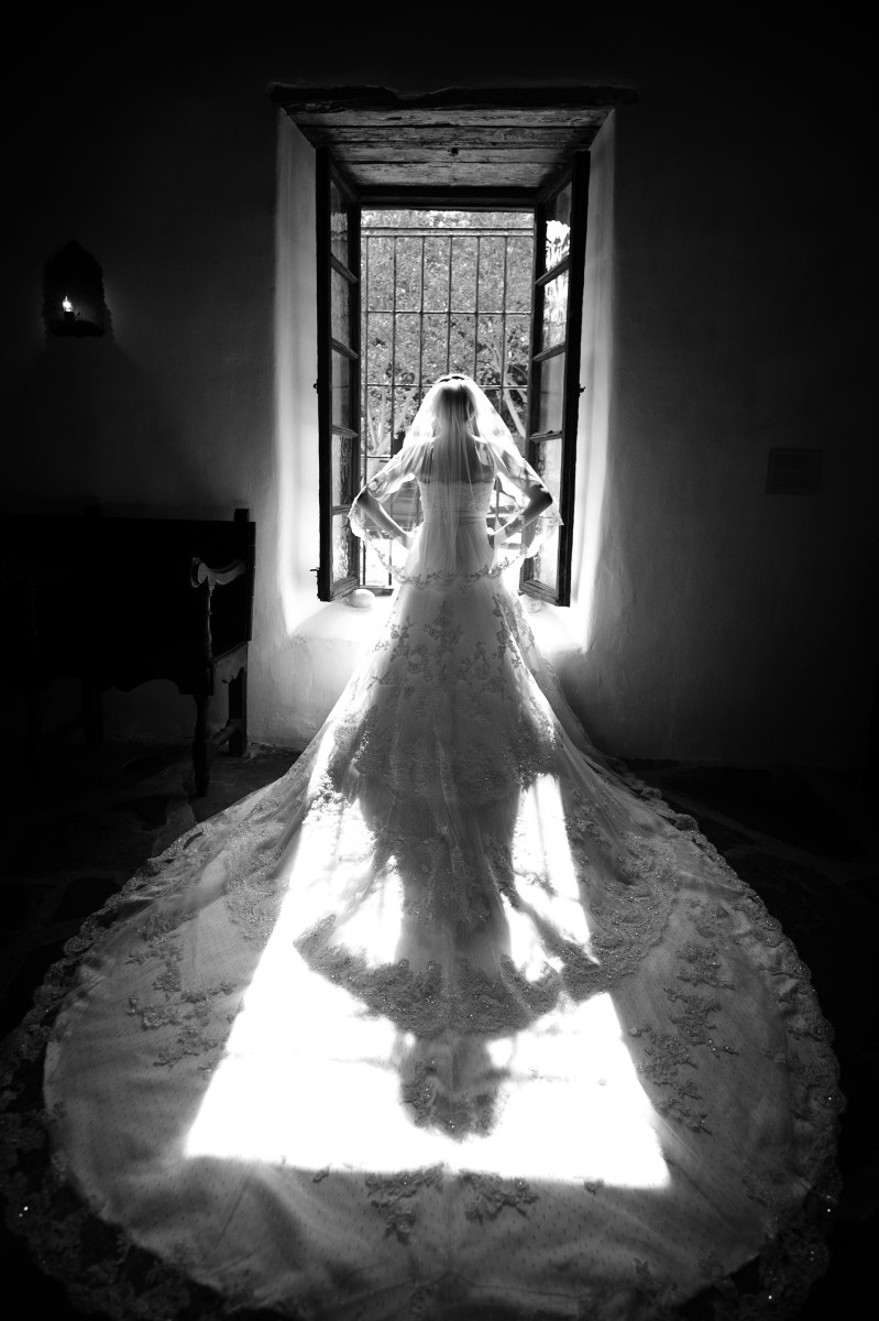 Bride in window of Spanish Governor's Mansion, San Antonio Texas