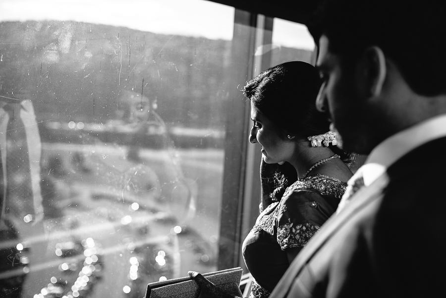 Bride and groom take elevator and marvel at cocktail party decor Sheraton Mahwah Hotel New Jersey