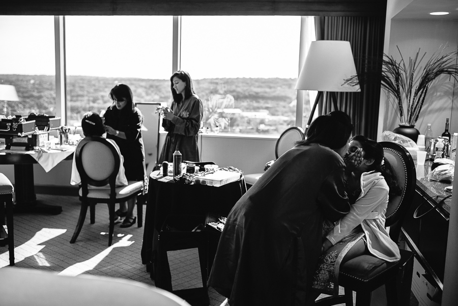 Mother kisses flowergirls during makeup Indian Getting ready  Sheraton Mahwah Hotel New Jersey