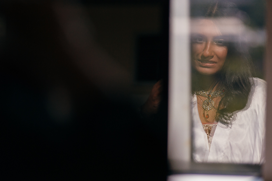 Bride window reflection Indian  Sheraton Mahwah Hotel New Jersey