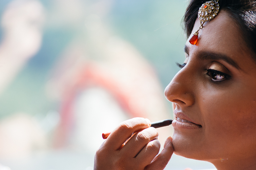 Indian Bride applying makeup at Sheraton Mahwah Hotel New Jersey