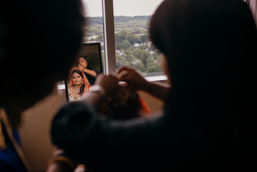 Bride in mirro Sheraton Mahwah Hotel