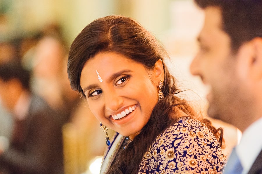 Bride smiles at groom Indian Wedding Reception at Rockleigh Country Club