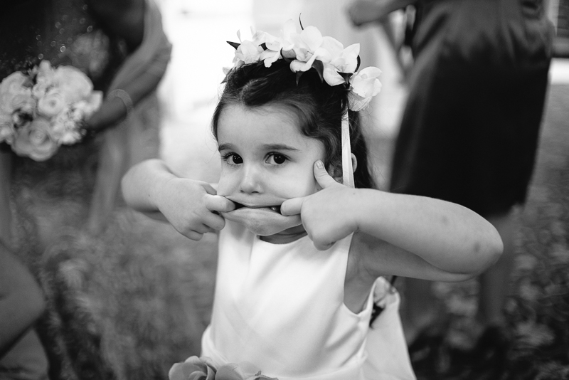 Flower girl pulling face