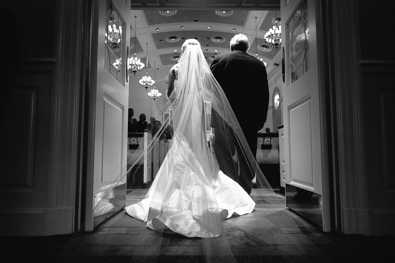 Father and bride enter through the door and ceremony at St. Luke's