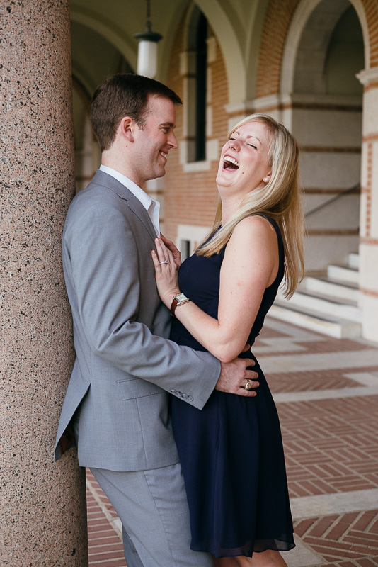 Couple at Rice University sharing a fun moment photographed by Philip Thomas