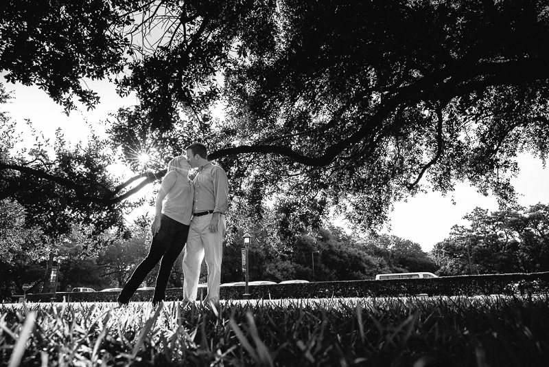 Couple under the trees for engagement shoot at Rice Uniiversity