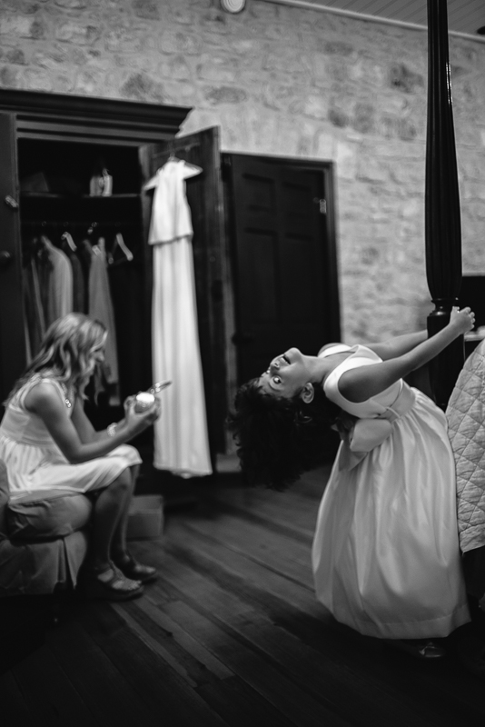 Girls playing inside Hoffman Haus Wedding day