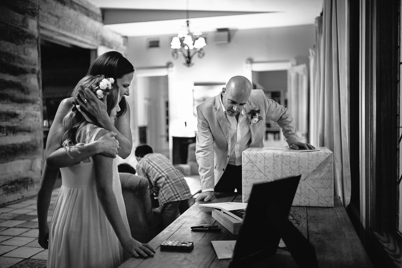 Gifts are opened by bride and groom Hoffman Haus wedding