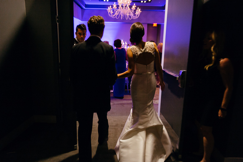 Couple enter W Hotel ballroom wedding