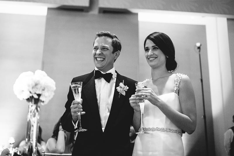 Couple getting roasted during reception at W Hotel, Austin