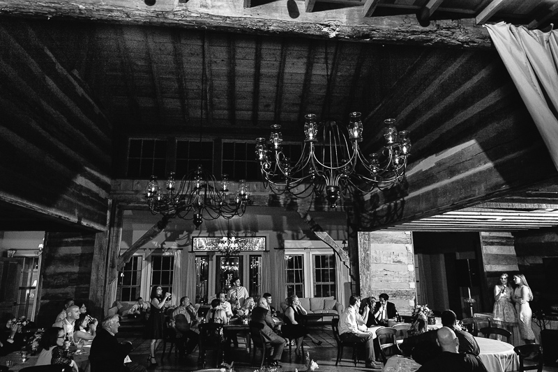 The brides daughters sing a song before all the guests during the reception