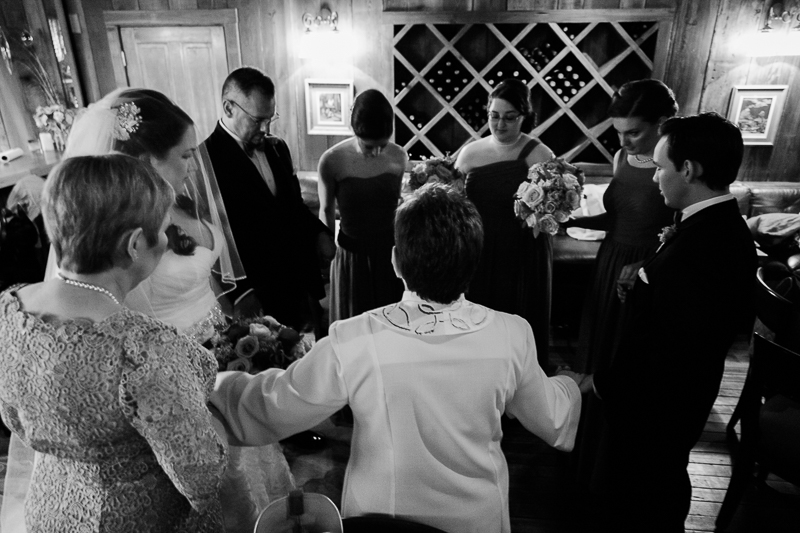 A prayer before the wedding ceremony at Welfare Cafe