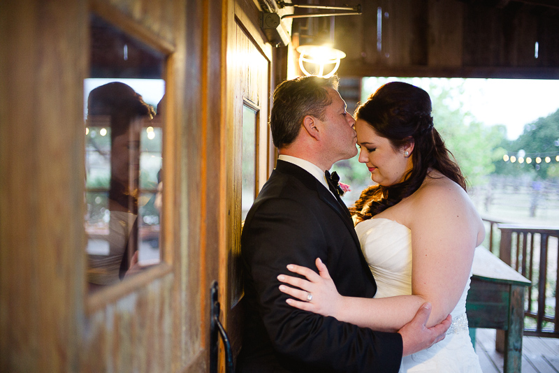 Couple embracing at Welfare Cafe wedding