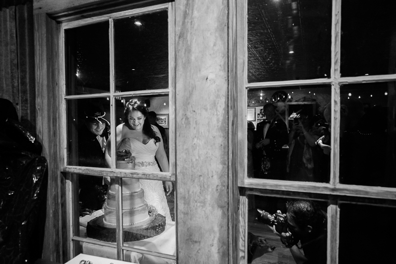 Cake cutting through window at Welfare cafe