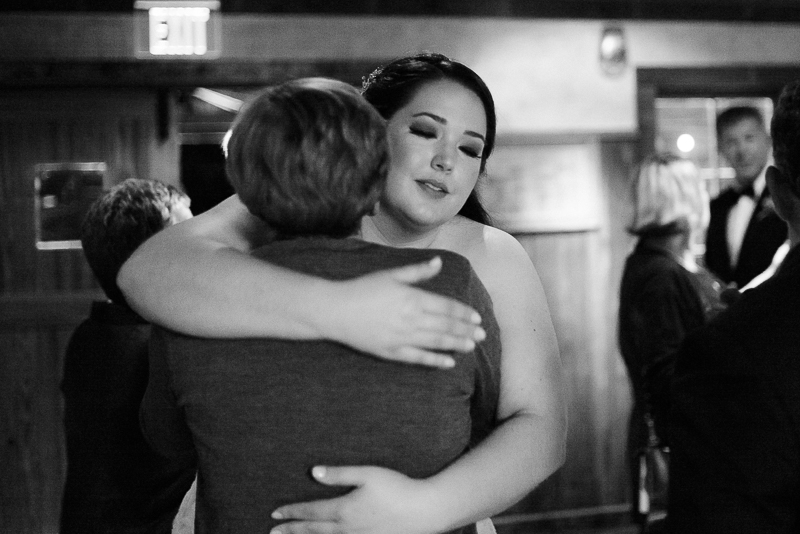 Bride hugging family member at Welfare Cafe