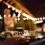 DJ spins records at Welfare Cafe wedding