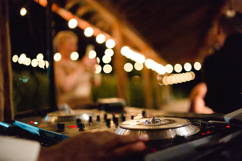 DJ spins records at Welfare Cafe wedding