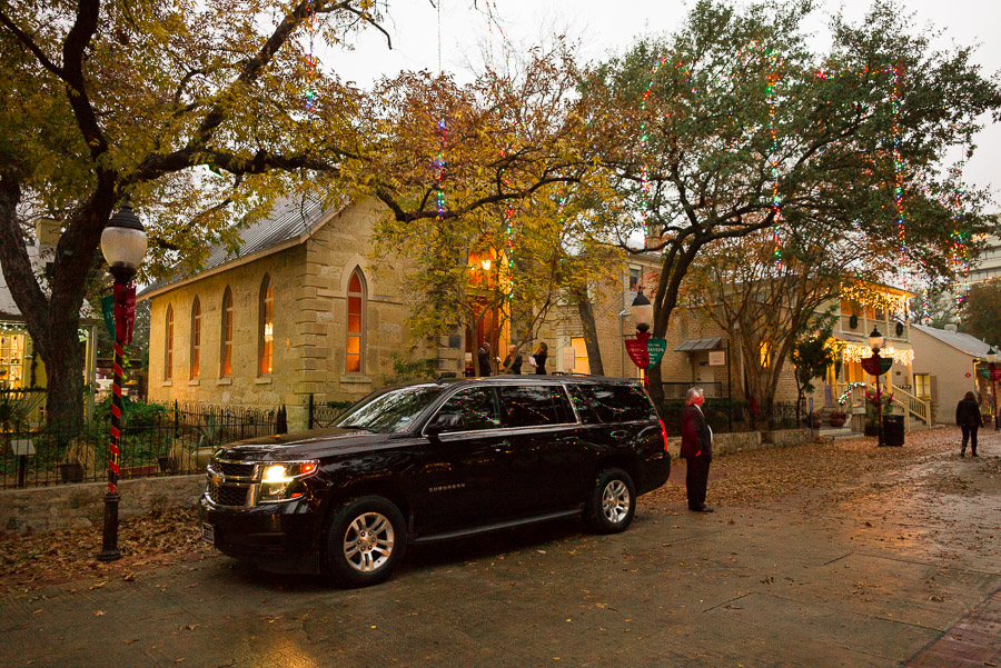 Late fall outside The Little Church at La Villita with holiday lights