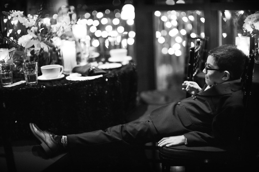 Little boy relaxes at Rio Plaza Wedding Reception