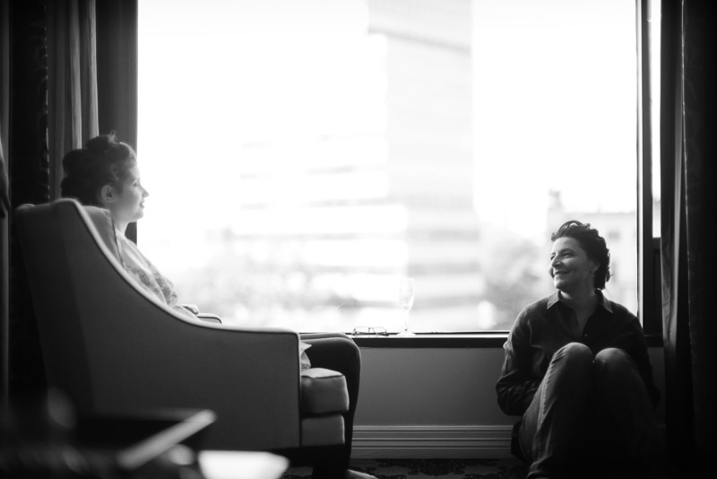 Mother smiles toward bride at Houston Omni Hotel