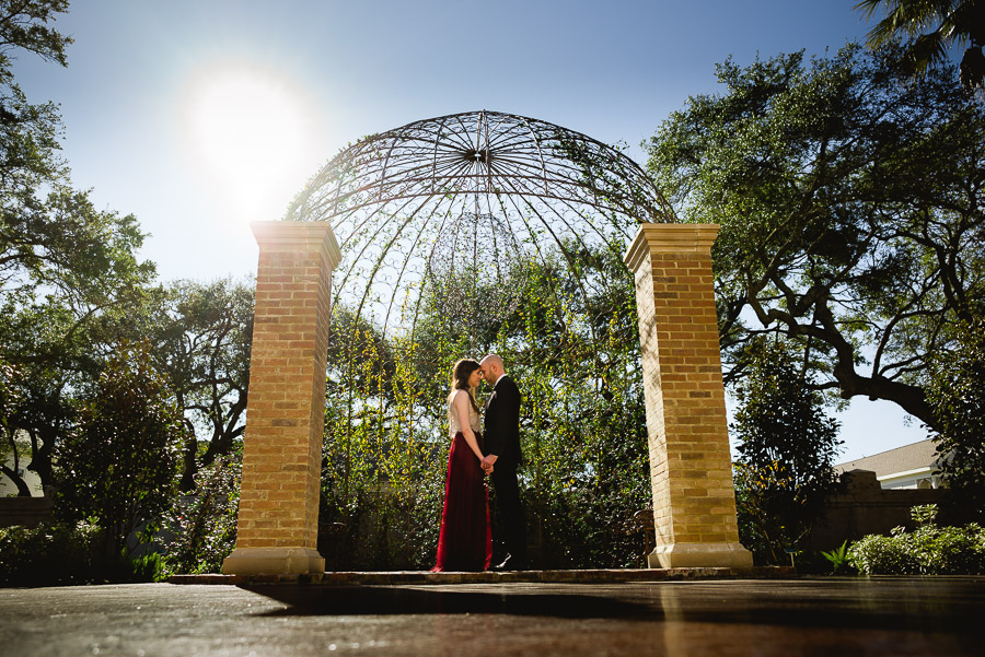 Couple under the trellis -The Bryan Museum Engagement Session 