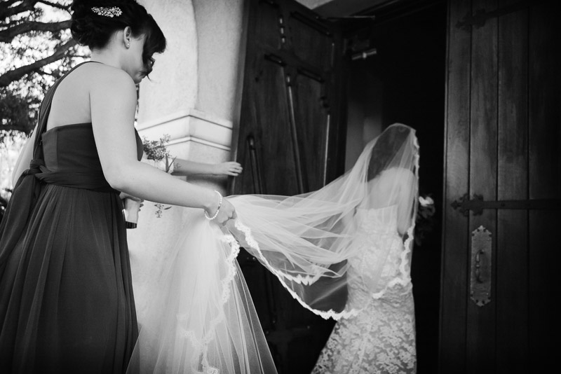 Bride enters church moments before walking down the aisle at St. Anne Catholic Church, Westheimer Rd, Houston