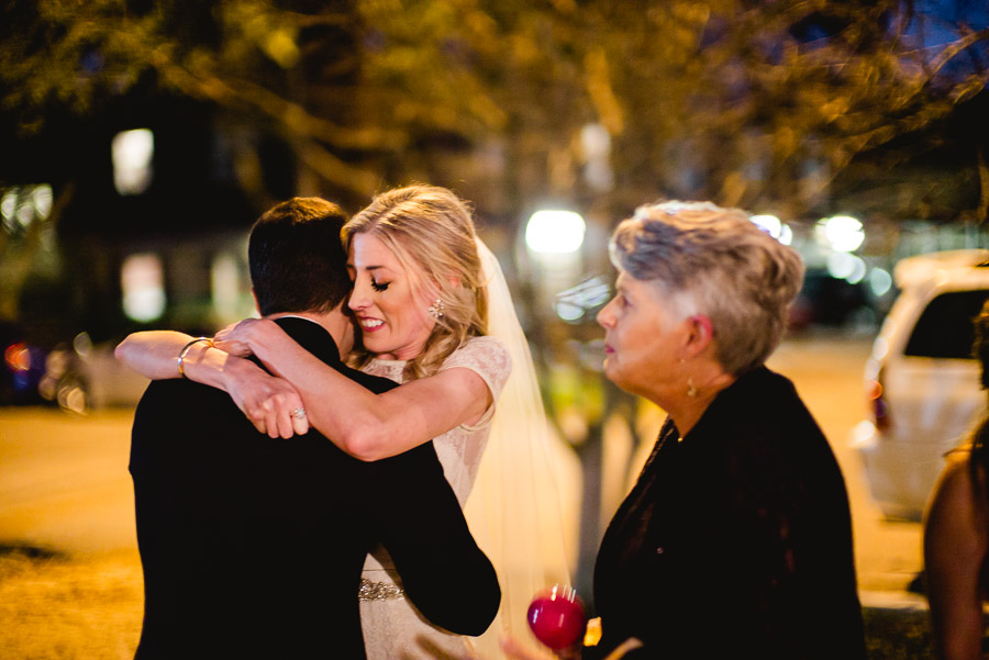 Bride hugging family member at Houston Heights Fire Station