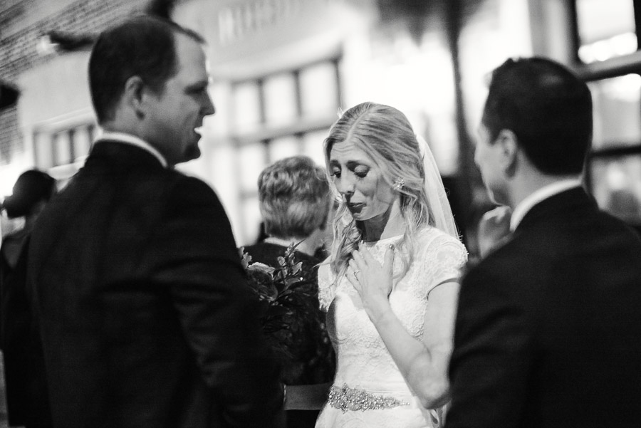 Fighting tears and happiness bride at Houston Heights Fire Station