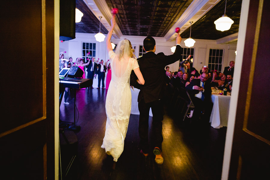 Jubilant couple enter wedding reception at Houston Heights Fire Station