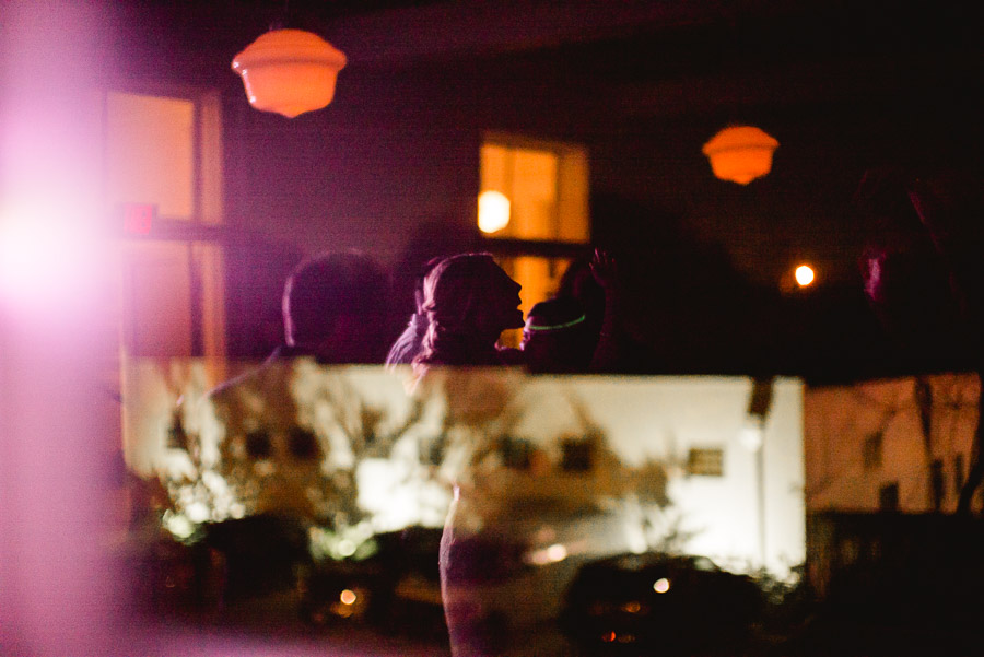 Leica Noctilux reflection in window wedding reception Houston Heights Fire Station