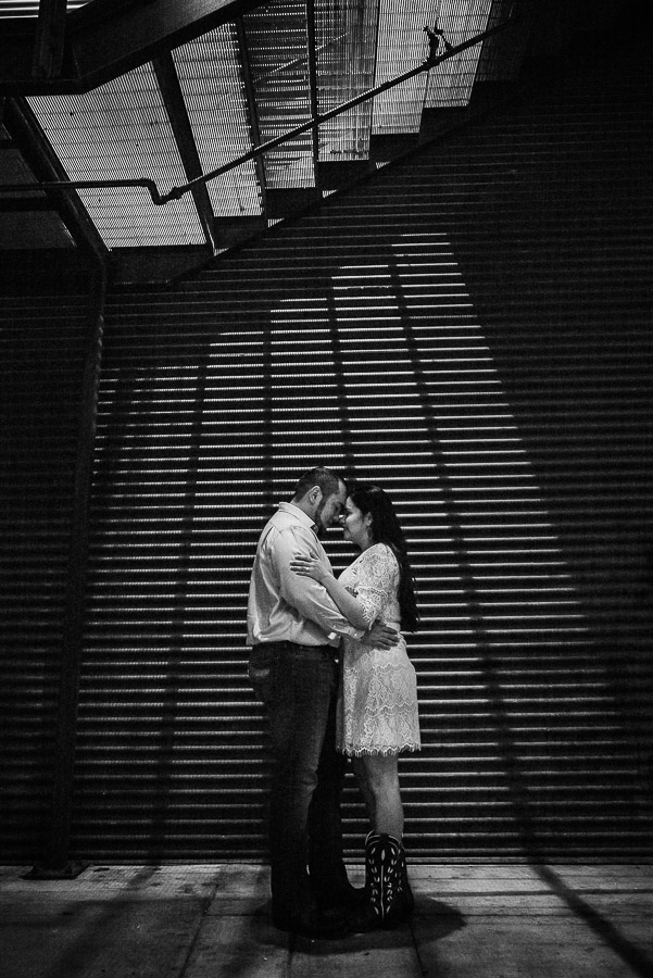 Shadow and lines at Pearl Brewery Culinary Institute building with engaged couple