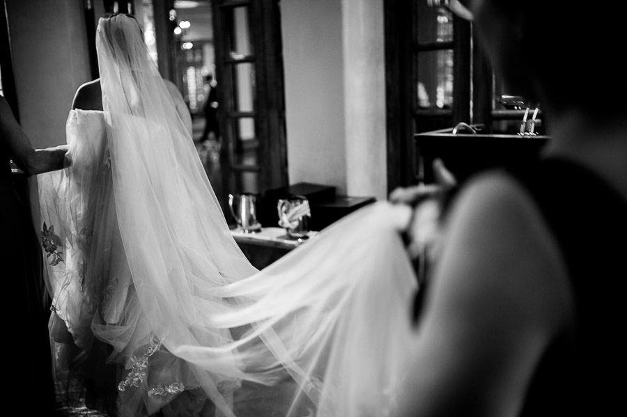 Wedding veil held by bride