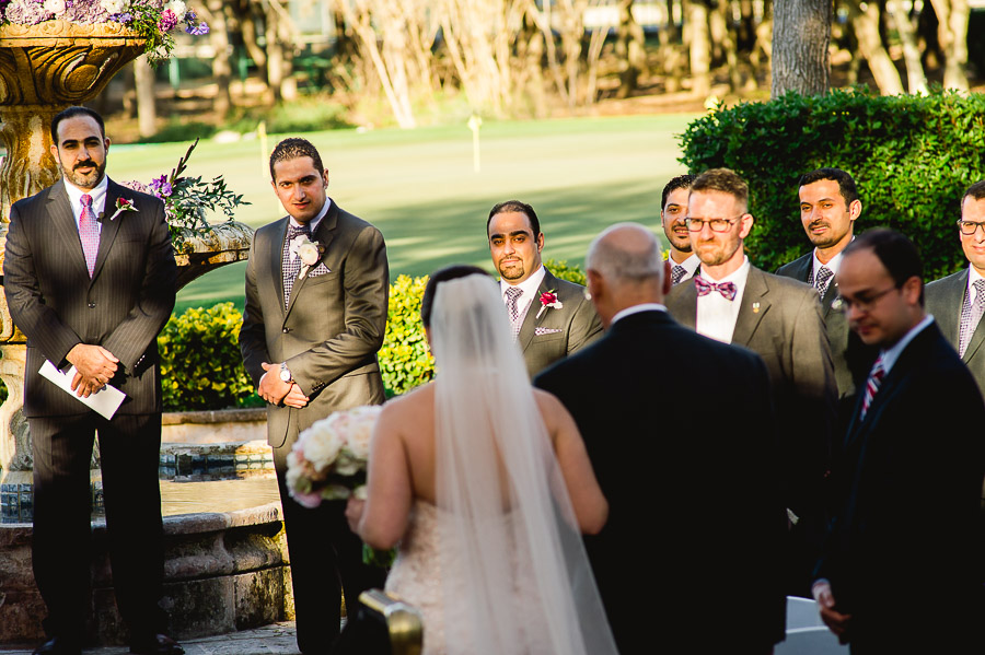 Groom sees bride for first time Dominion Country Club Wedding