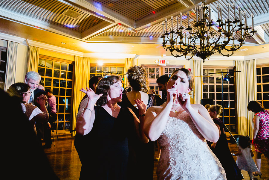 Bride and friend dancing at Dominion Country Club Wedding