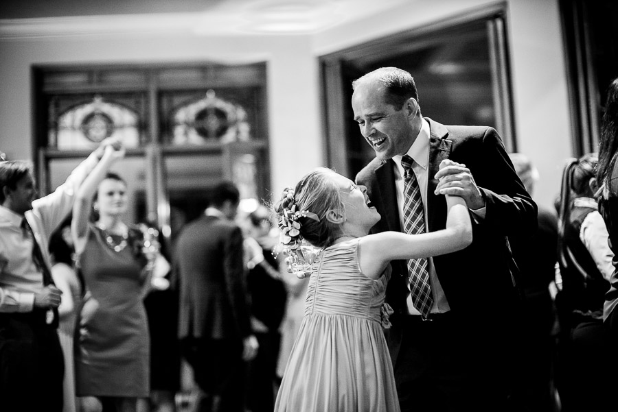 Father and young daughter share laughter at Dominion Country Club Wedding