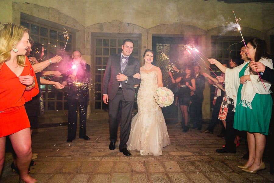 Couple departing with sparklers at Dominion Country Club Wedding
