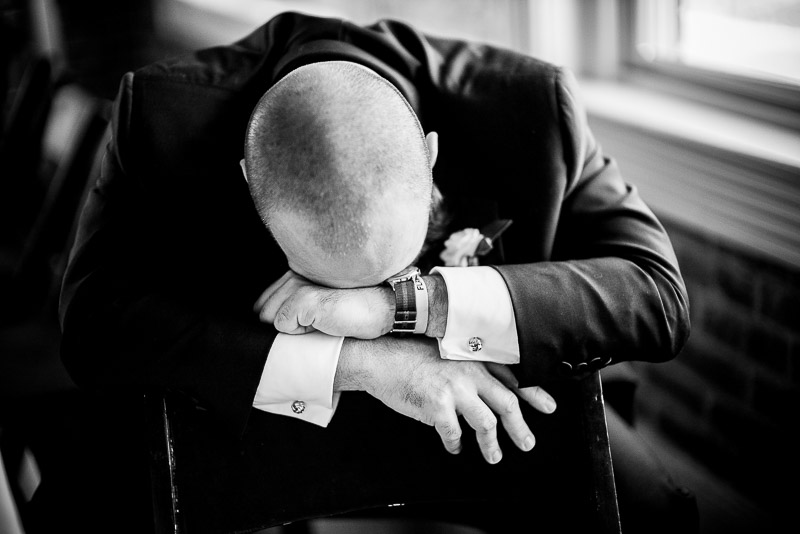 Groom rests his head at Houston Fire Station 3