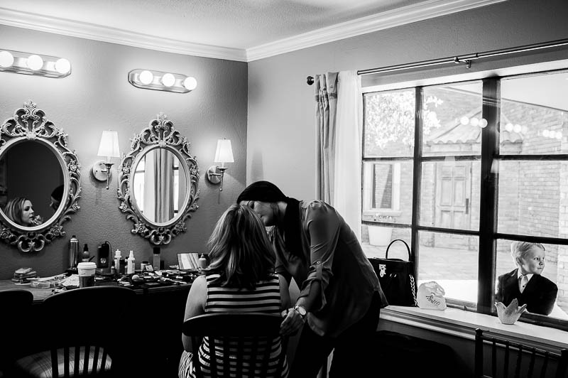 Ring bearer at window with mother in foreground at The Gallery, Houston Texas